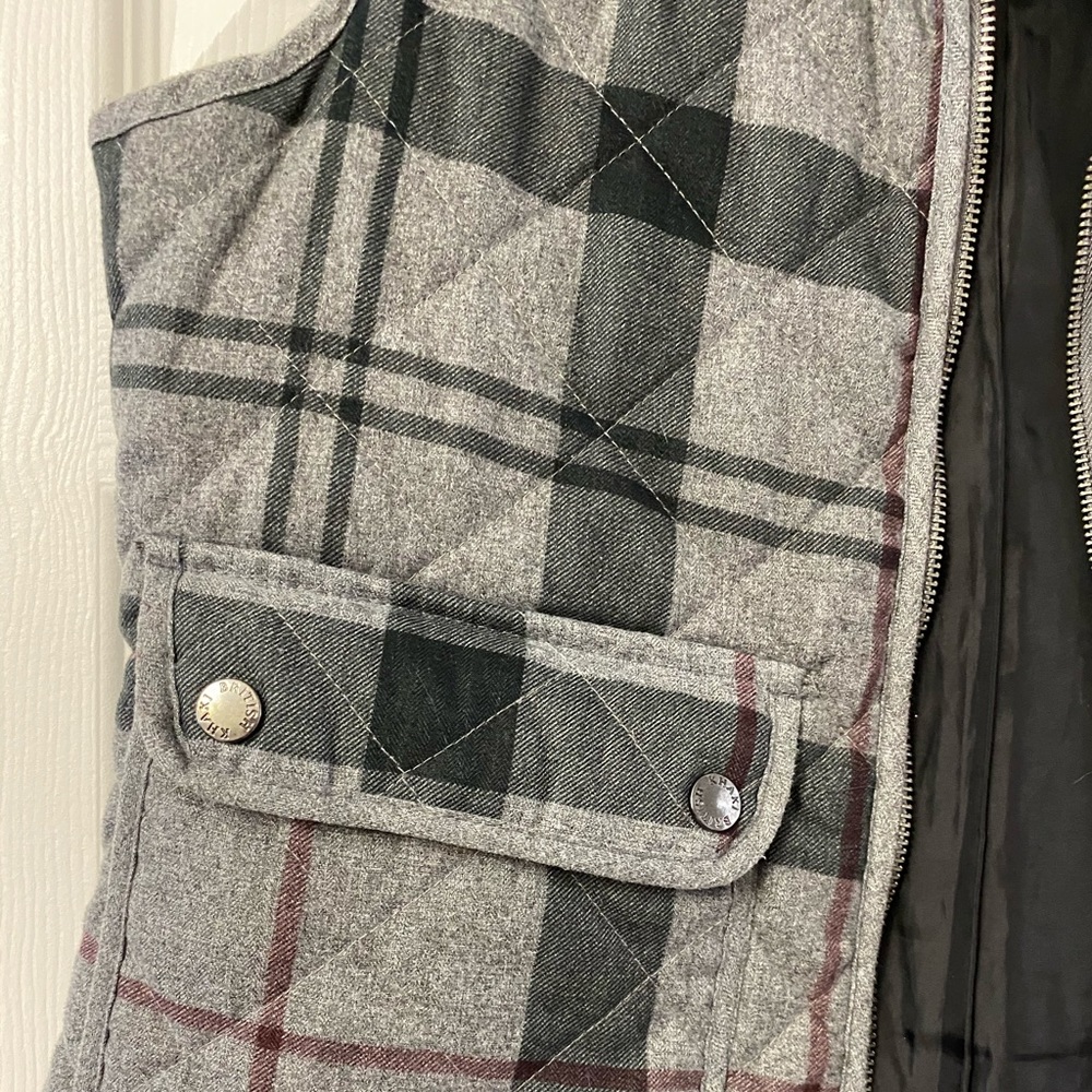Light, striped vest